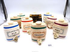Ten small china spirit barrels 'Royal Victoria' Wade, (some with crazing).
