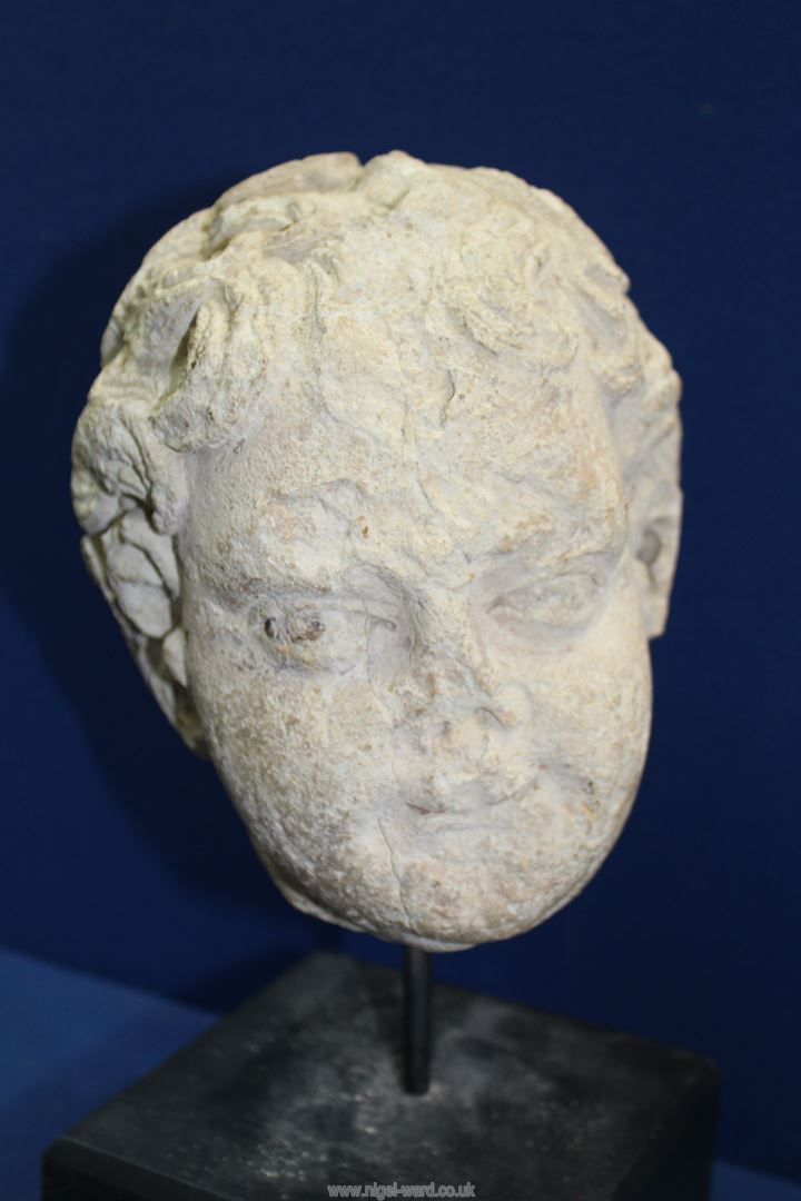 A very early life size marble head from a free standing figure of a young child. - Image 2 of 15