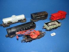A quantity of Rolling stock 'O' gauge - black flatbed with red crane,