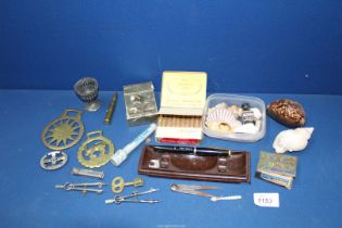 Miscellaneous small collectibles including; WWII bullet, pewter egg cup, corkscrew, pen,
