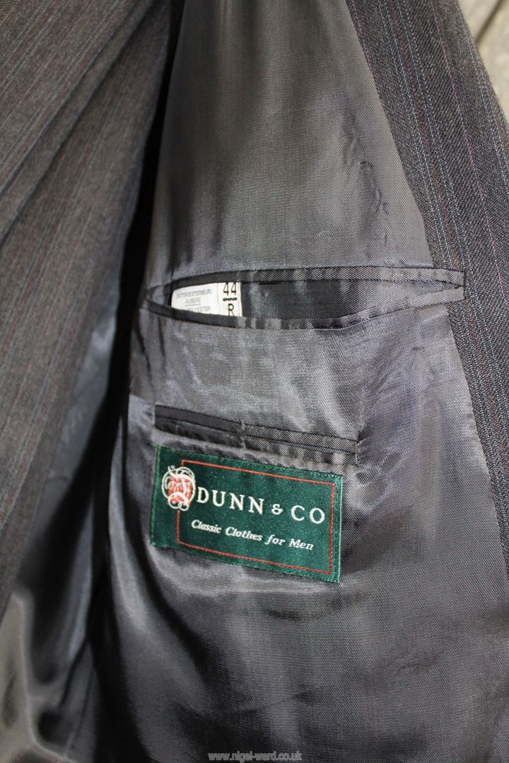 A Dunn & Co. double breasted suit in dark grey with blue stripe jacket size 44R, trousers 38R. - Image 2 of 3