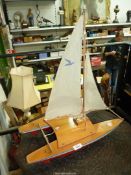 A Toy sailing catamaran/pond yacht by Seifert, Germany, 20" long.