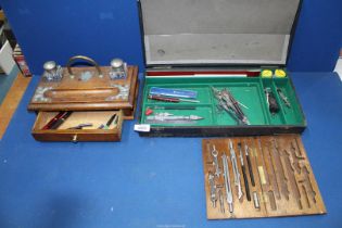 A Draughtsman set, cased, plus a standish with inkwells.