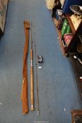 A vintage Apollo tubular 10ft steel spinning rod and a Gilder spinning reel made by J.W.