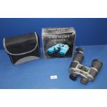 A pair of Centon 12 x 50 Binoculars in soft case, boxed.