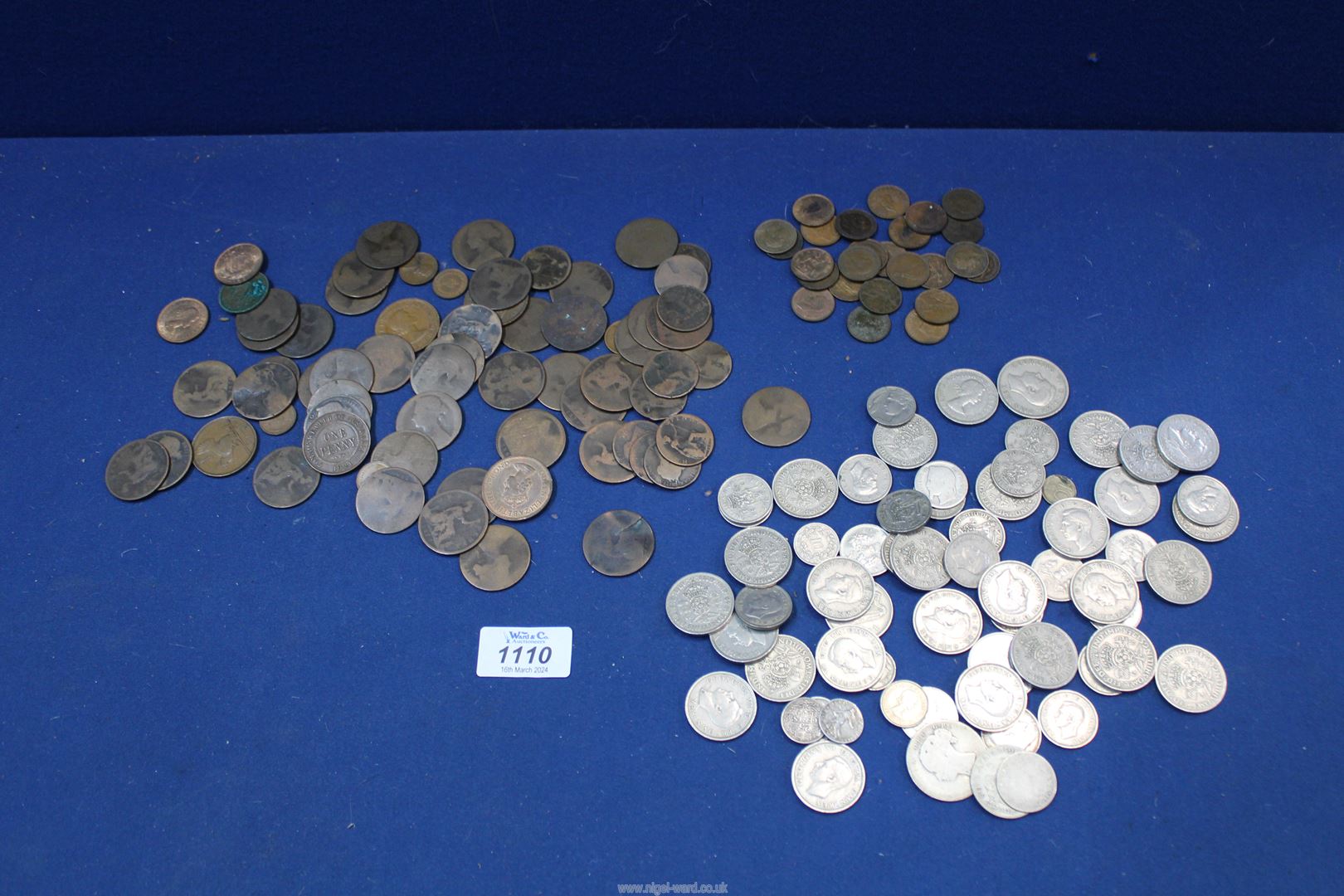 A collection of old pennies, George VI shillings and a collection of Victorian/Edwardian farthings.