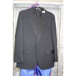 A black dinner suit by Hodges, jacket 42R, trousers 37" waist, 31 1/2" inside leg.