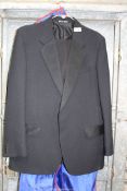 A black dinner suit by Hodges, jacket 42R, trousers 37" waist, 31 1/2" inside leg.