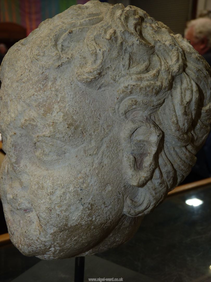 A very early life size marble head from a free standing figure of a young child. - Image 15 of 15