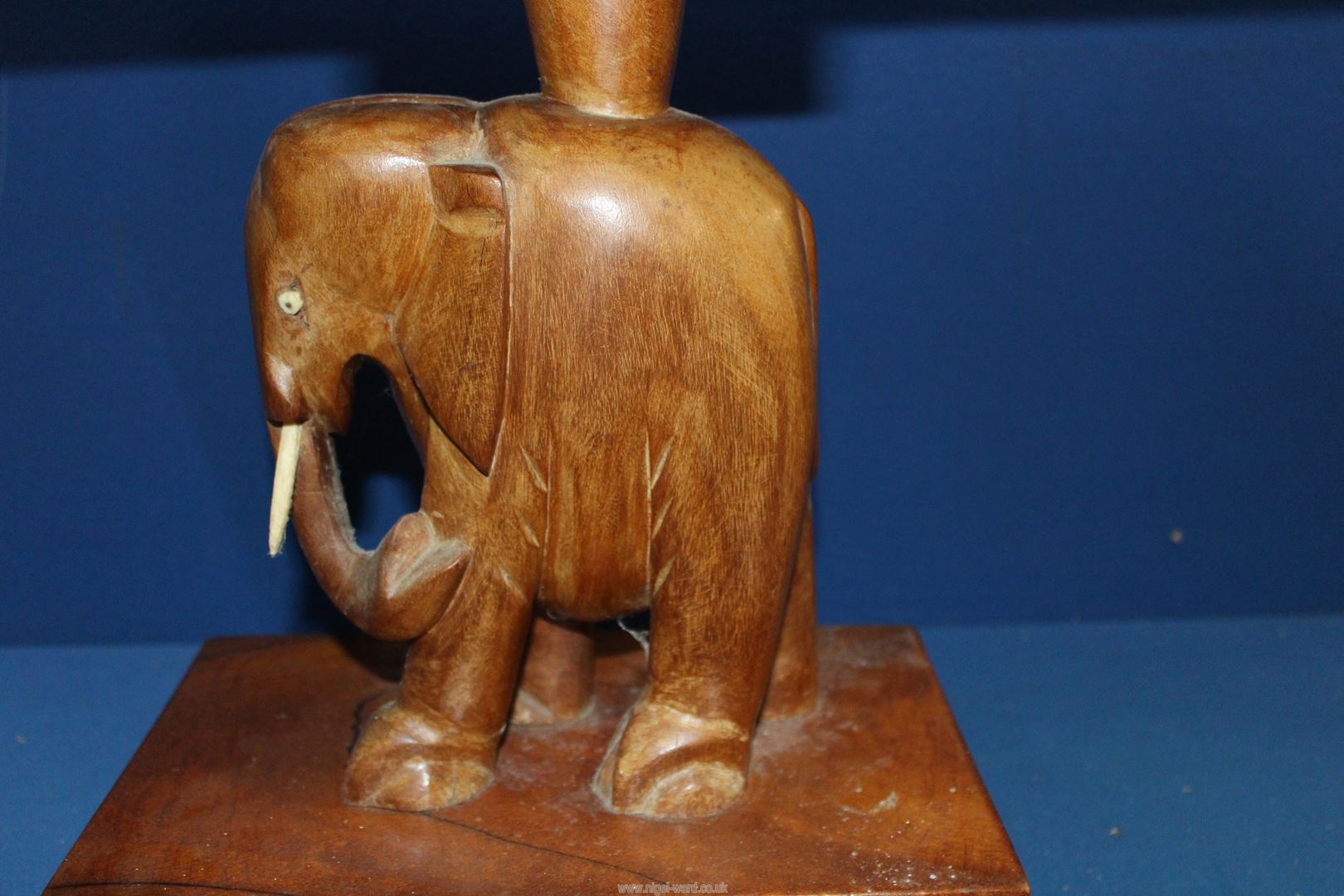 An Occasional table with carved elephant base, 21" long x 16 1/2" wide x 15" high. - Image 2 of 2