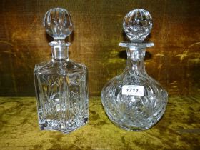 A round crystal decanter and stopper together with hexagon shaped crystal decanter and stopper,