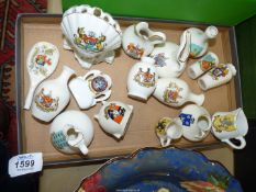 A quantity of souvenir china including; Exeter tennis racquet, Bristol clam shell, Clevedon,
