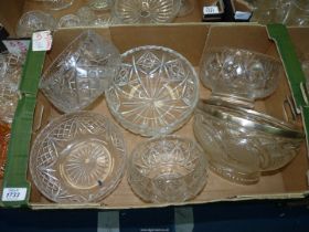 A quantity of trifle and fruit bowls including one with a silver rim.