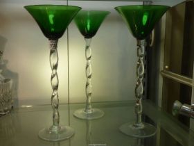 Three glass table centrepieces, clear spiral stems and base with green glass bowls, 12" tall.