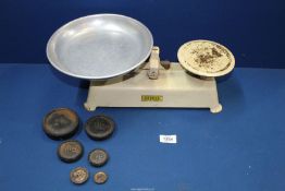 A vintage set of Harper kitchen scales and imperial weights.