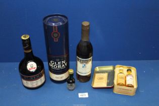 A quantity of Bottles of whisky and brandy including Glen Moray Single Malt, St.