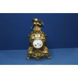 A heavy polished Brass cased Mantel/Bracket Clock having an enamelled face with Roman numerals,