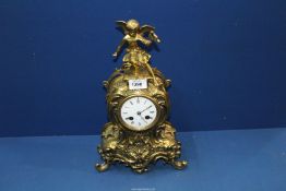 A heavy polished Brass cased Mantel/Bracket Clock having an enamelled face with Roman numerals,