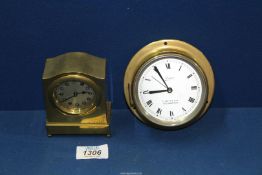 A Marpro small Bulkhead clock and a small brass desk clock.
