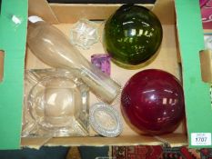 A small quantity of glass including fishing floats, oil lamp chimney, ashtray, etc.