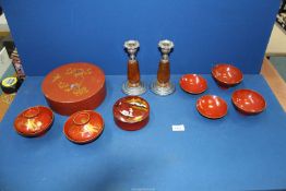 A quantity of 1950's lacquered Japanese trinket boxes, four lacquered sake or rice bowls,