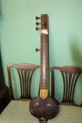 An Indian musical instrument - 'Sarat Sardar & Sons' Sitar, a/f.