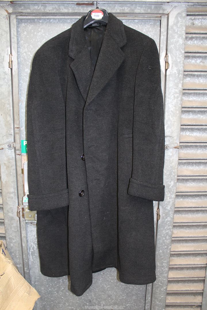 A Gents black Crombie overcoat for Austin Reed, single vent with turn back cuffs, size 44 approx.