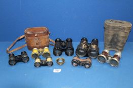 A small quantity of field glasses incl. two cased pairs, one made in France, some a/f.