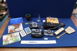 Four cameras and miscellanea to include Olympus Trip 35, Kodak Coloursnap and Nikon Af,