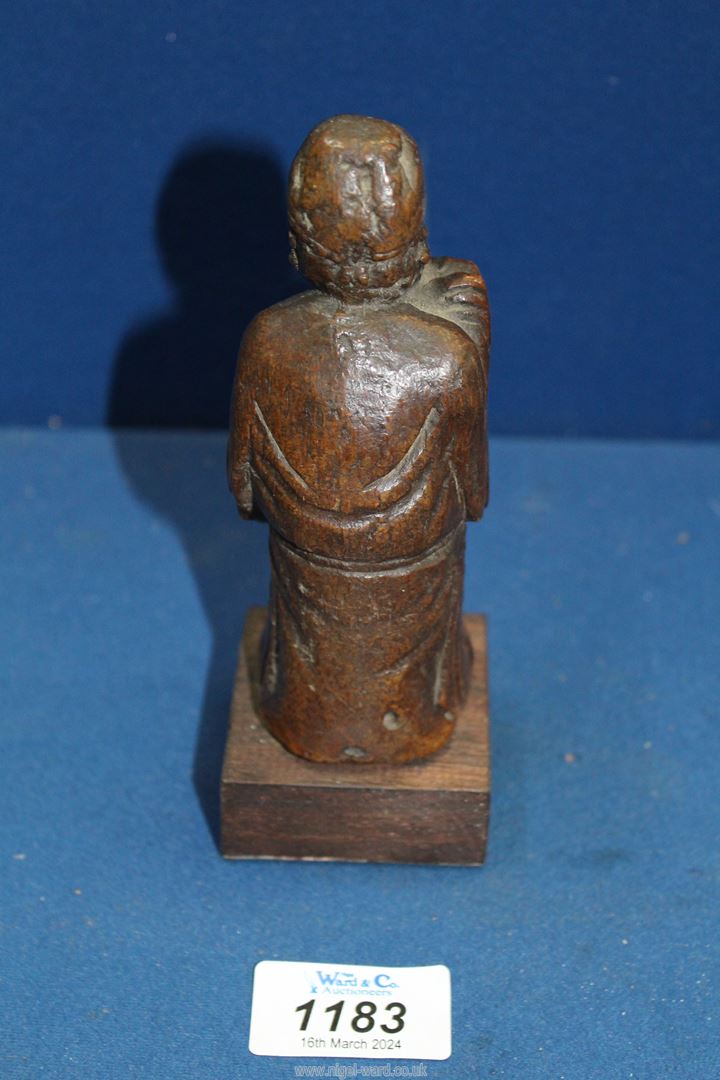 An early Chinese woodcarving of a flautist, probably Ming dynasty, 6'' tall. - Image 3 of 4