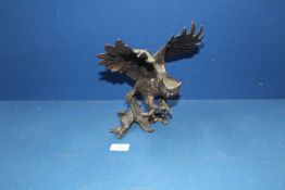 A heavy cast metal model of an Owl, 10" tall.