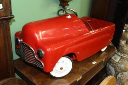 A child's red Pedal car, a/f.
