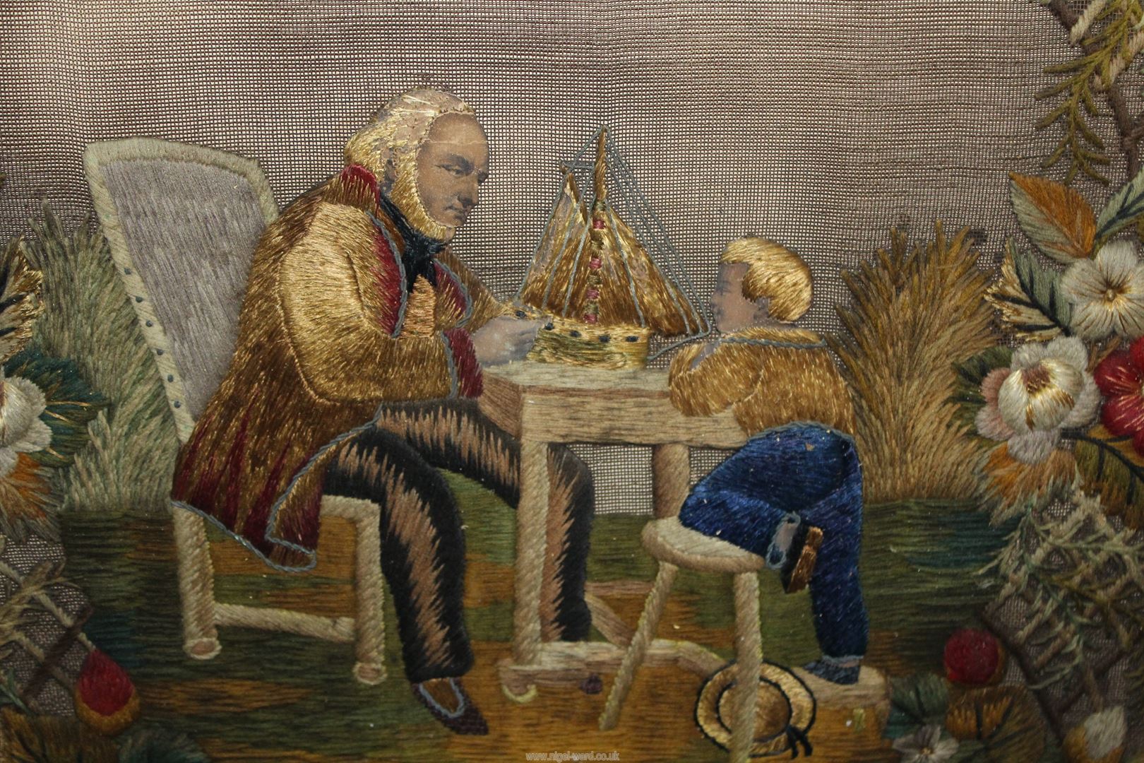 A stumpwork picture of Boy and his father making a boat, unframed, 17 3/4" x 21". - Image 3 of 3