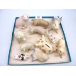 A small quantity of pigs including small Wemyss pig, two Belleek pigs, two Royal Dux pigs, Beswick,