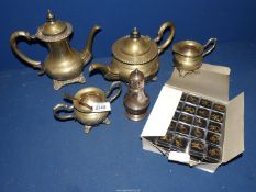 A four piece Epns Teaset (very rubbed) and a box of 'Level 10' pin badges.