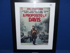 A reproduction 'Propositito Di Davis' framed poster.