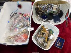 A large quantity of costume jewellery including watches, beaded necklaces, etc.