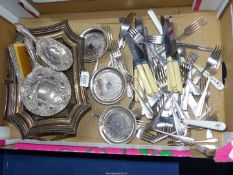 A quantity of plate including cutlery, coasters, brush, comb (a/f.) and mirror set, etc.