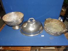 A plated food cover, punch bowl and two handled dish.