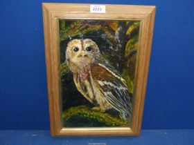 A wooden framed Oil on board depicting an owl sat in a tree, unsigned, 11 1/2" x 16 1/2".