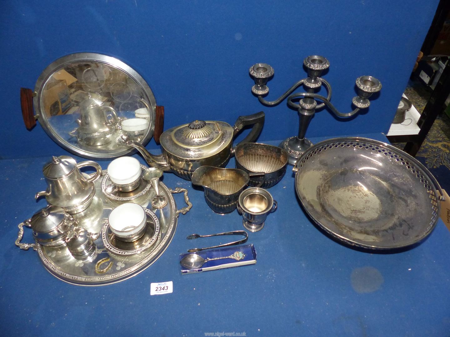 A quantity of plated items including three piece tea set, tea for two with china lined cups,