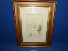 A framed Watercolour scene on the Nile with sailing vessels making their way with a Mosque in the