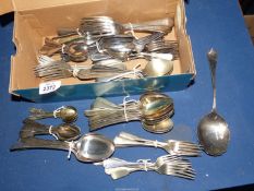 A quantity of mixed cutlery including spoons, forks, teaspoons, etc.