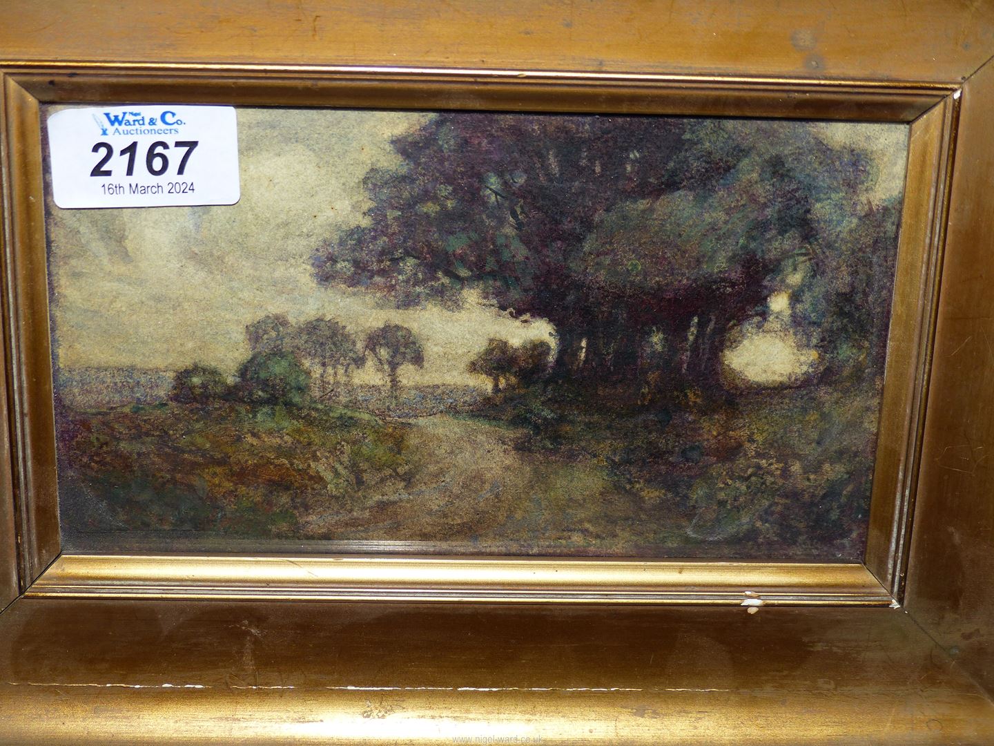 A 19th century Watercolour in original frame, depicting trees and a landscape,