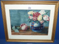 A framed watercolour of a still life of roses in a vase one lying by the side, signed lower right E.