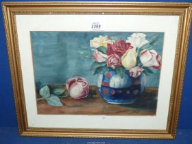 A framed watercolour of a still life of roses in a vase one lying by the side, signed lower right E.