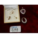 A small quantity of costume jewellery including pendant and odd earrings.