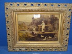 An ornately framed Crystoleum picture of ladies near a thatched cottage feeding ducks under a