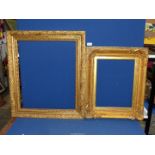 Two ornately carved gilt picture frames - aperture sizes 19" x 22 1/2" and 12 1/4" x 15 3/4".