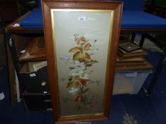 A wooden framed Watercolour depicting flowers, signed lower right (M.O. Elliott), 17" x 34".